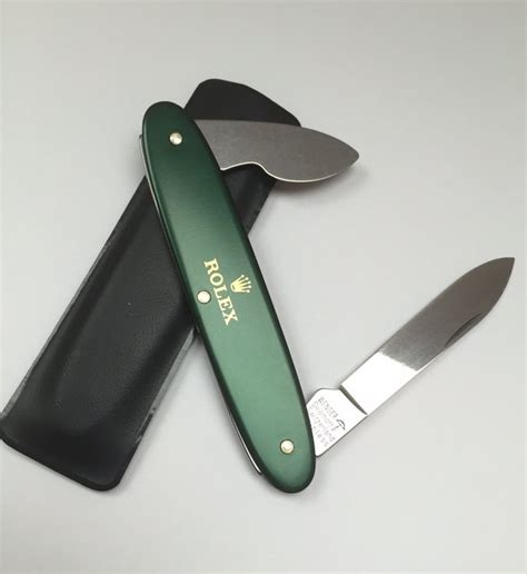 rolex wenger pocket knife